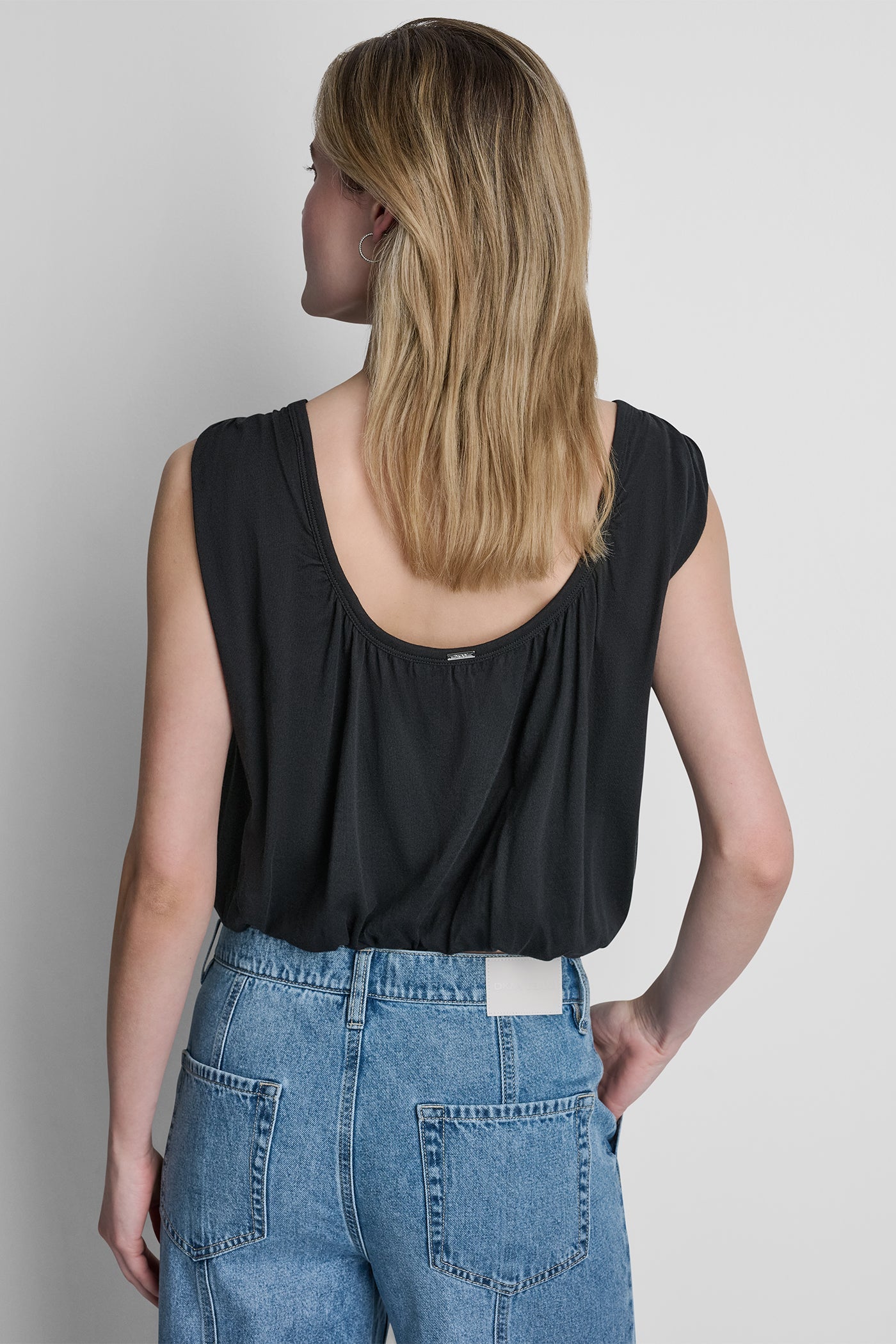 SLEEVELESS RUCHED TOP