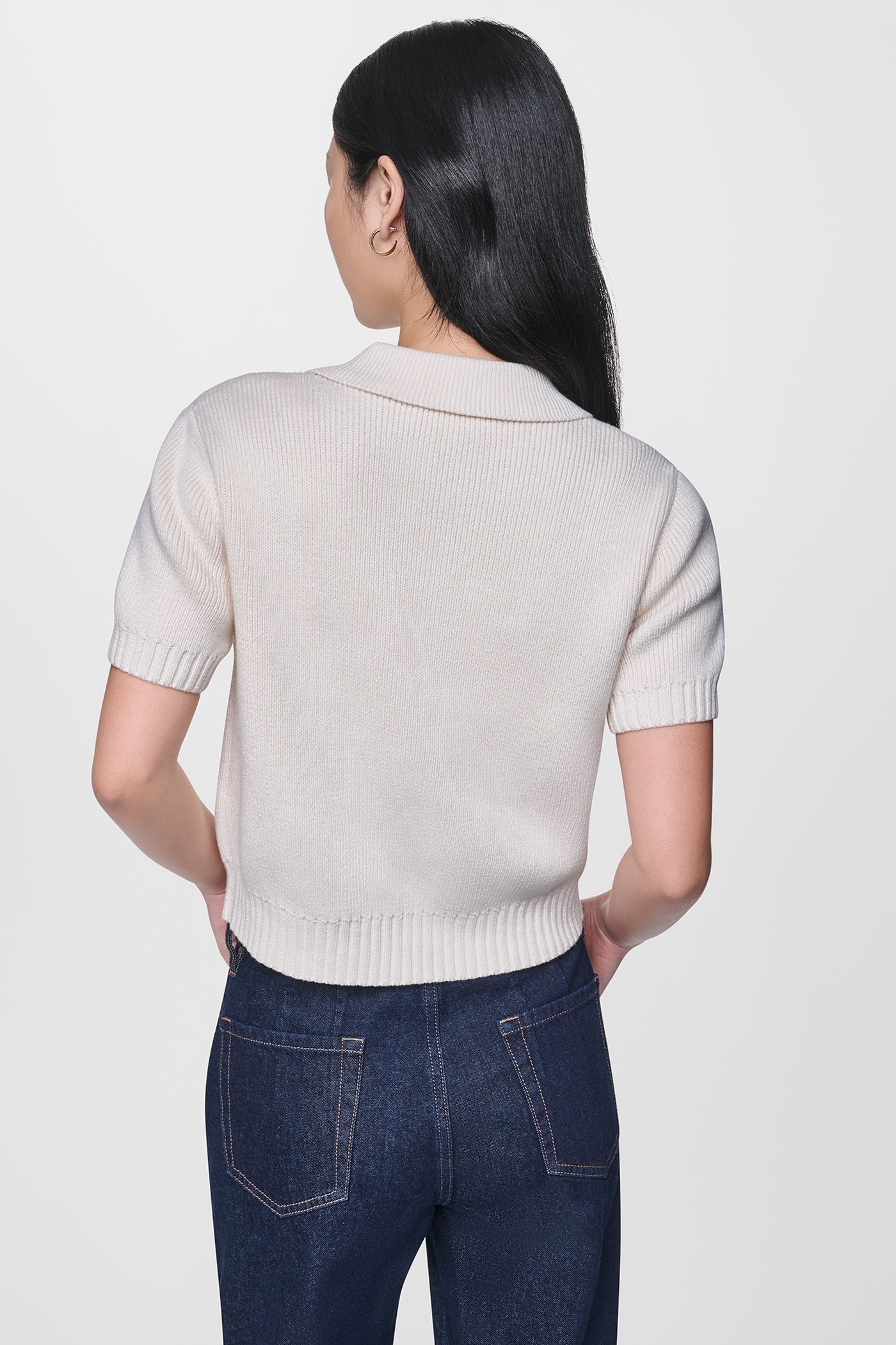 SHORT SLEEVE TIE FRONT POLO SWEATER