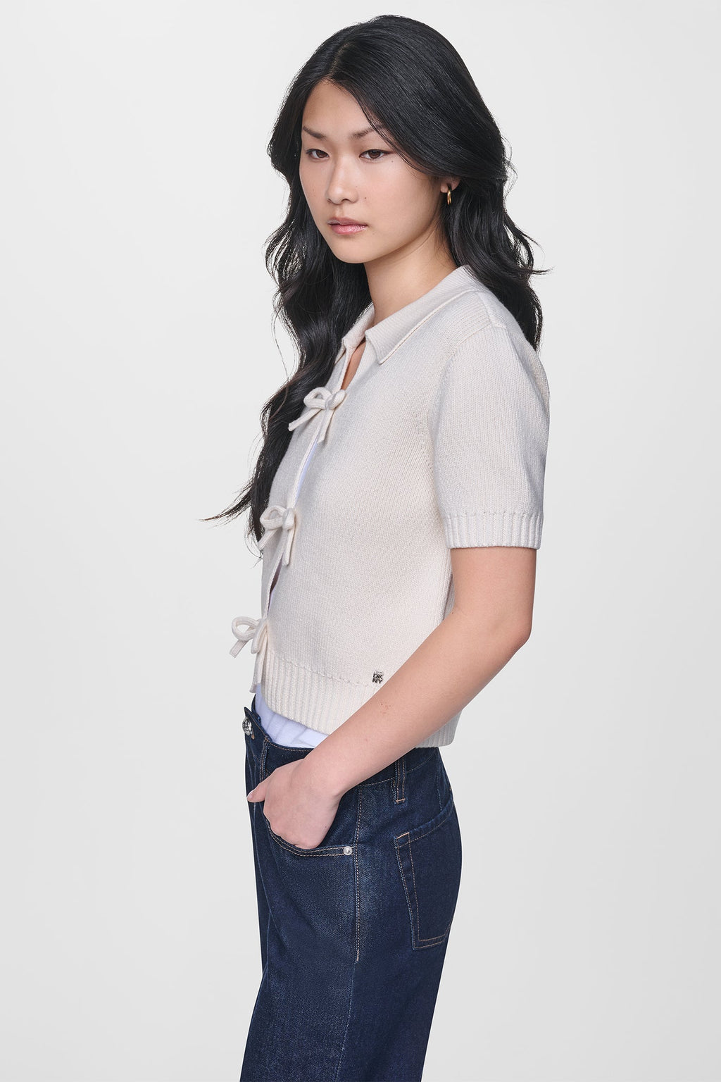 SHORT SLEEVE TIE FRONT POLO SWEATER