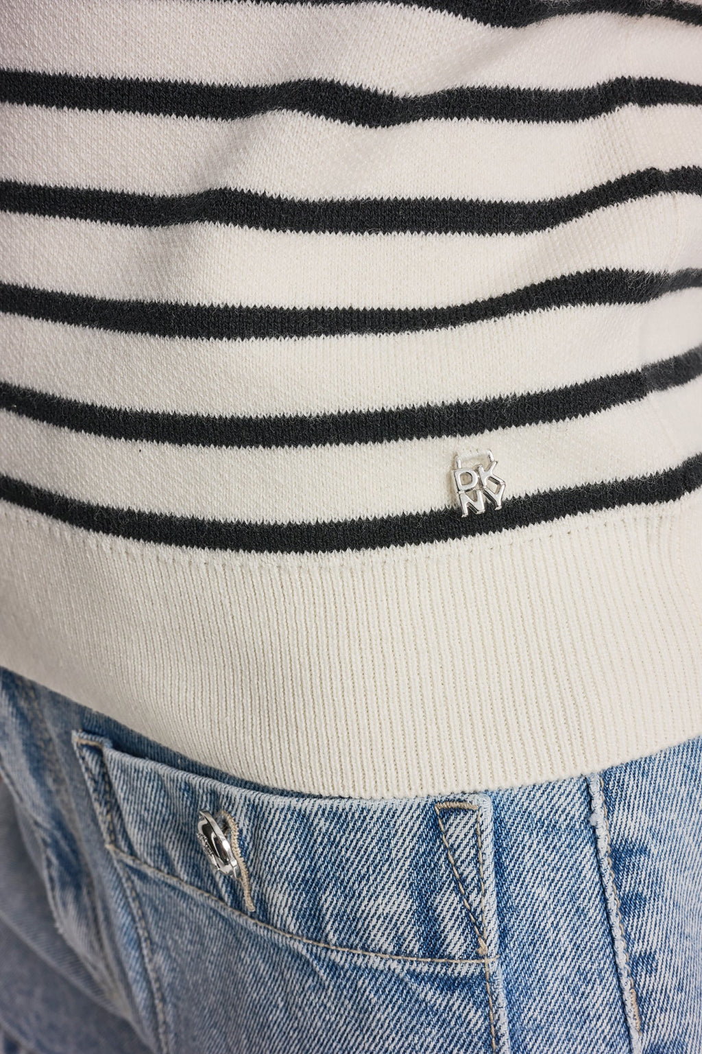 SLEEVELESS STRIPED SWEATER