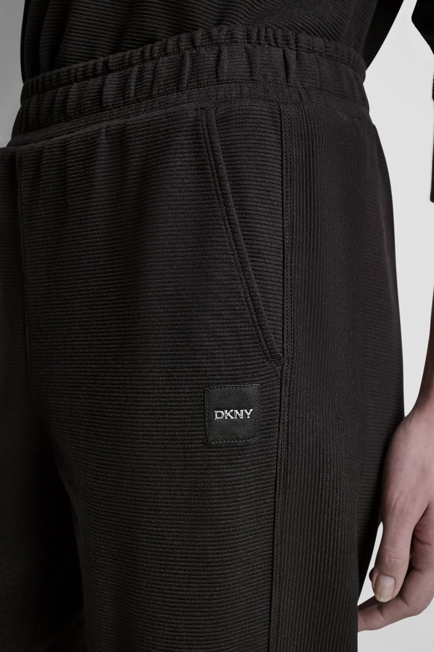 HIGH-RISE RIB TRACK PANTS